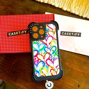 CASETiFY 
Rainbow Graffiti Hearts by Corey Paige Designs